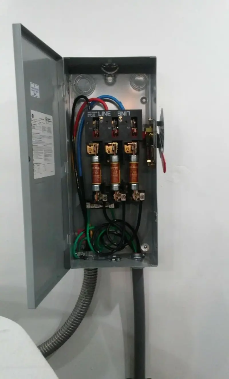 Three-phase disconnect switch installed for Smoke Detector Installation in Elmendorf